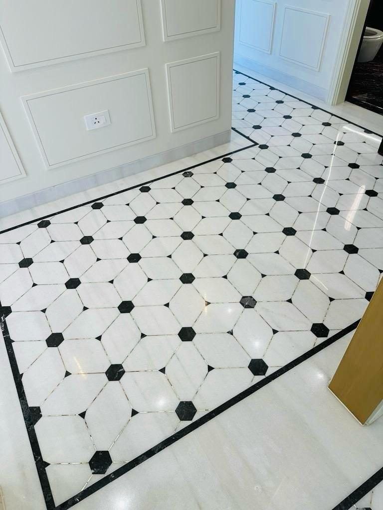 Marble flooring by Nexus Inlay Creation